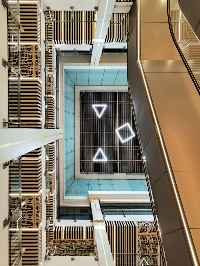 Abstract view of a modern ceiling with geometric lights in Mangaluru, India.